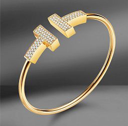 продажа Золотой браслет с бриллиантами Tiffany & Co. T в салоне «Emporium Gold»
