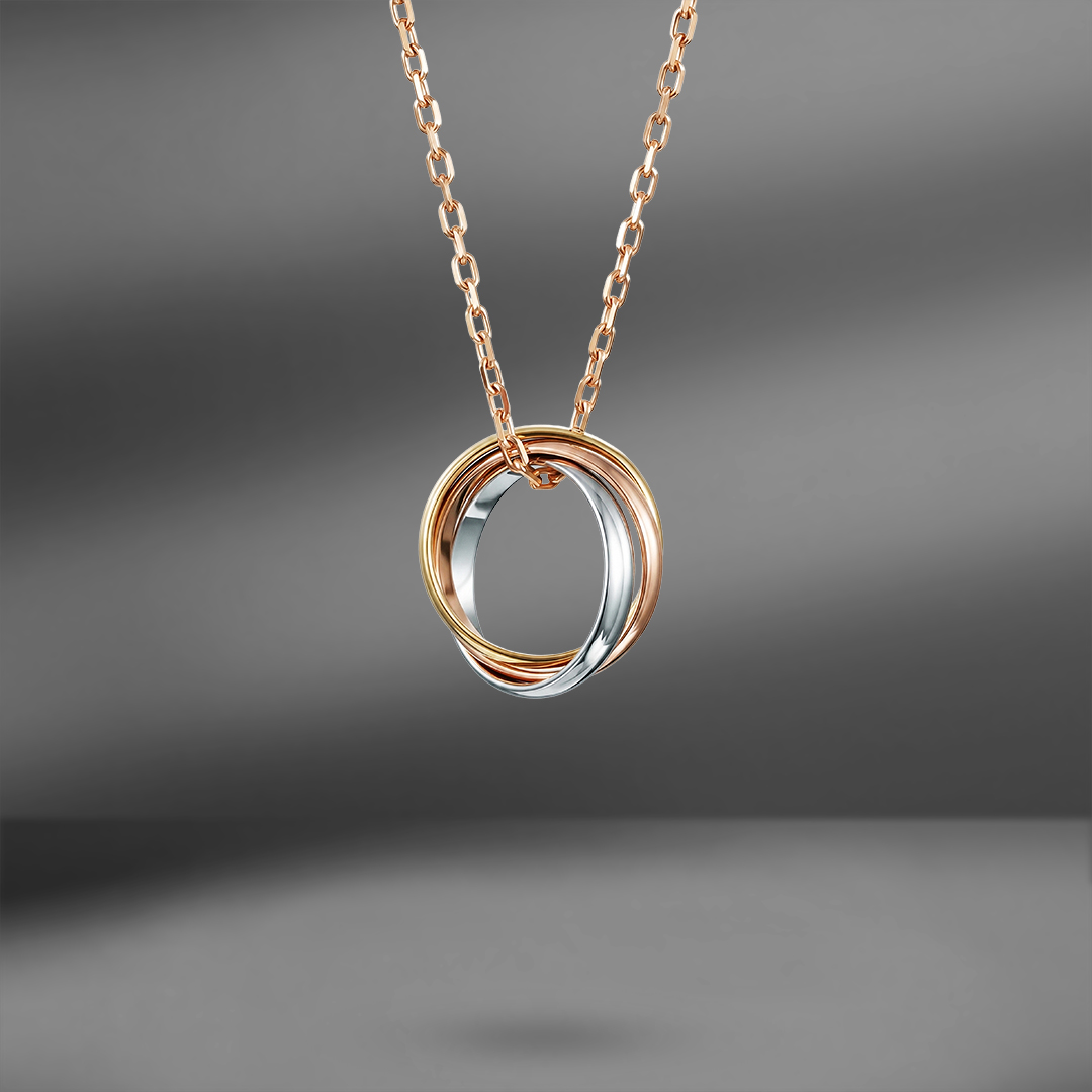 продажа Золотая подвеска Cartier Trinity Vintage в салоне «Emporium Gold»