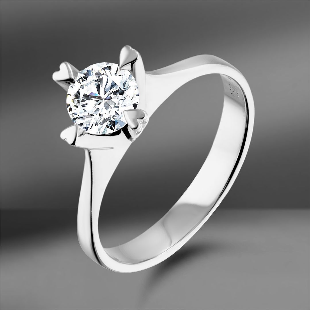 Золотое кольцо с бриллиантом 0.59Ct