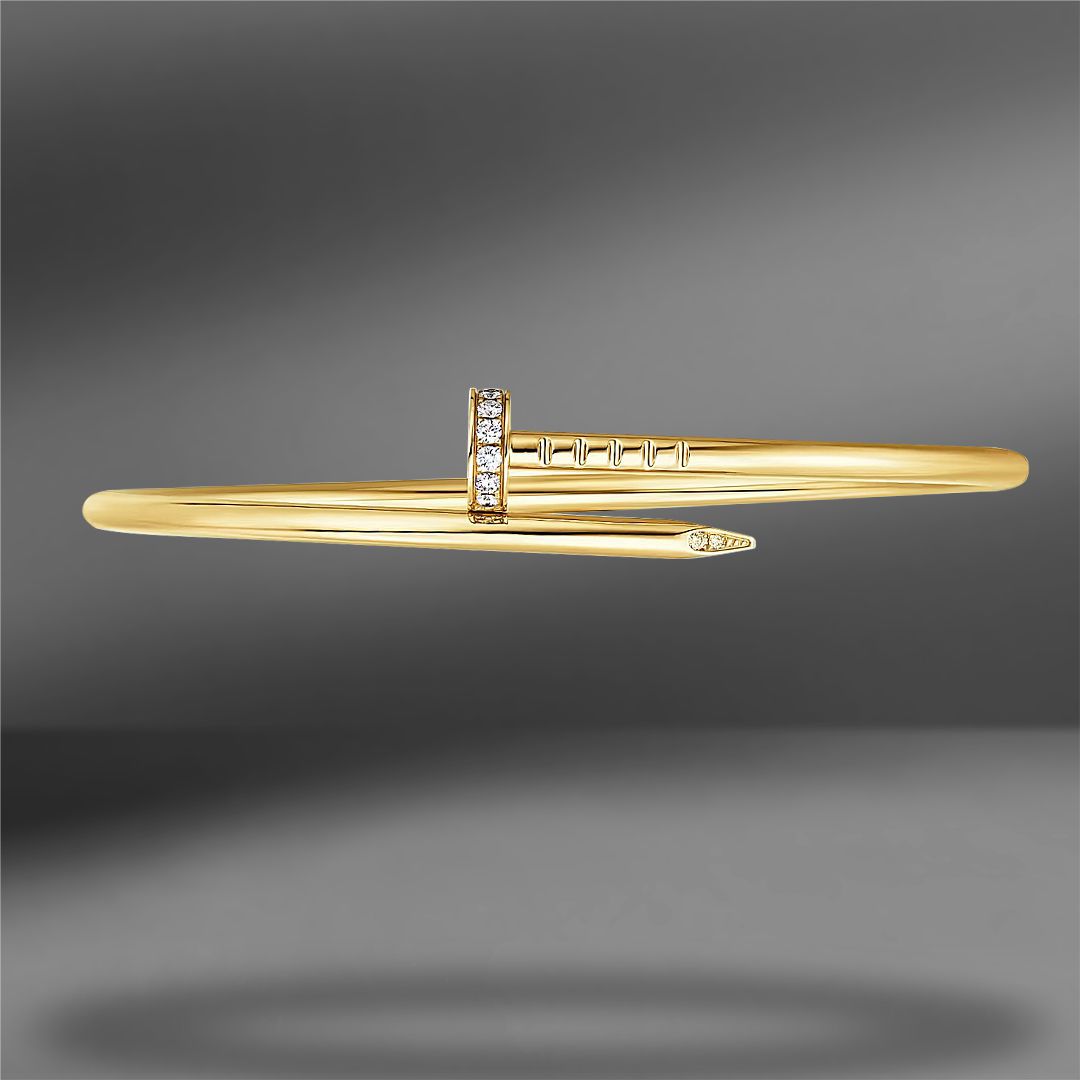 продажа Золотой браслет с бриллиантами Cartier Juste un Clou  в салоне «Emporium Gold»