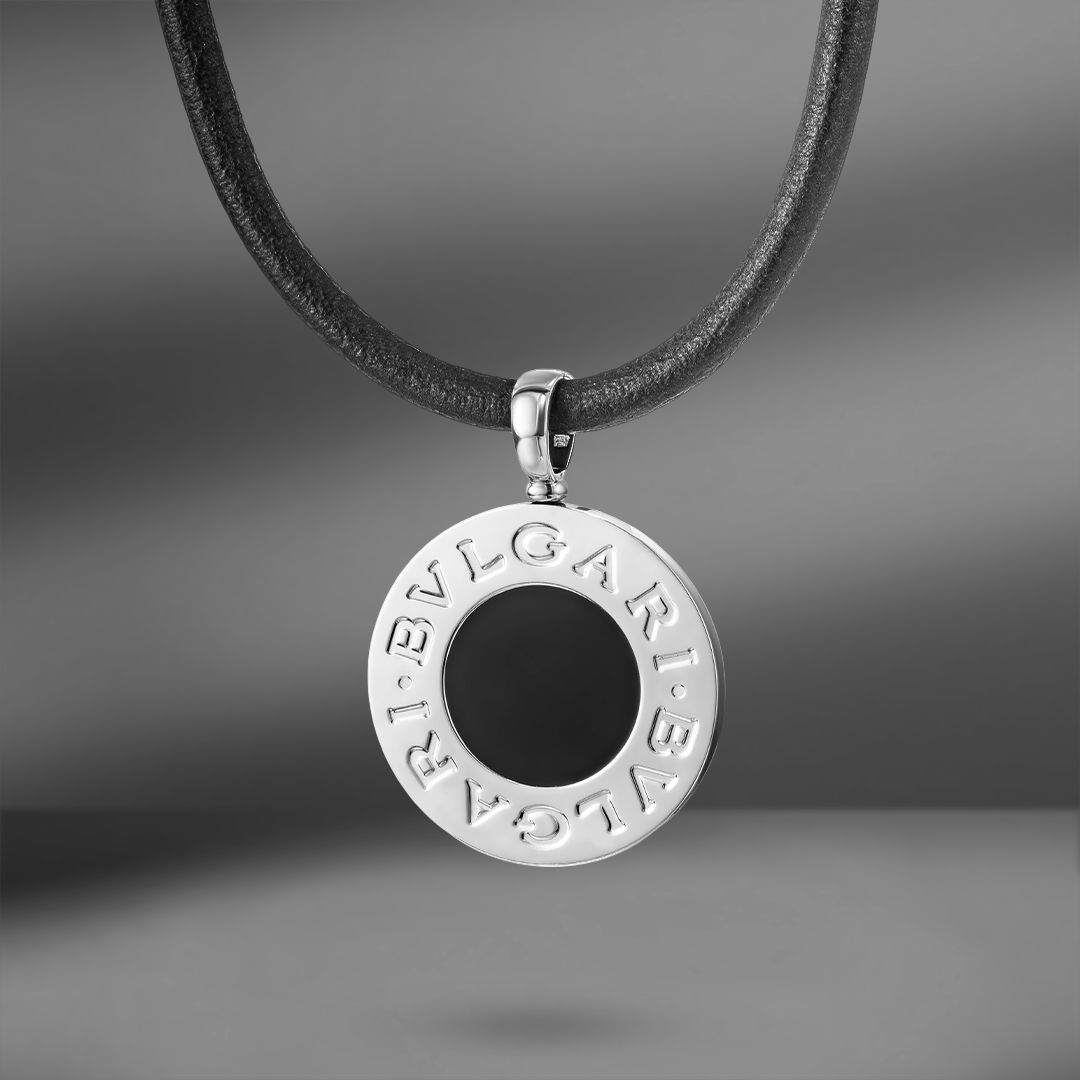 продажа Пoдвескa c ониксом и перламутром Bvlgari Tondo в салоне «Emporium Gold»