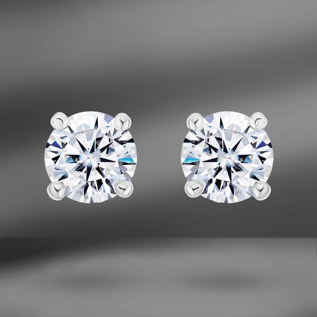 Пусеты Tiffany&Co. Solitaire с бриллиантами 0.31 Ct