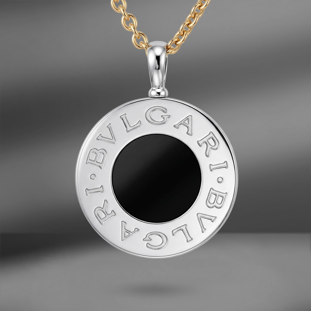 продажа Пoдвескa из золота и стали с ониксом Bvlgari Tondo в салоне «Emporium Gold»