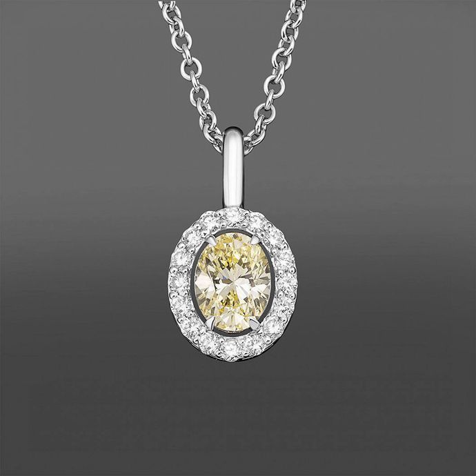 Бриллиант Tiffany Diamond весом 128,54 карата и новый дизайн броши-подвески Tiffany & Co. со знаменитым кристаллом, а также кольца, подвеска и серьги с бриллиантами Fancy Yellow