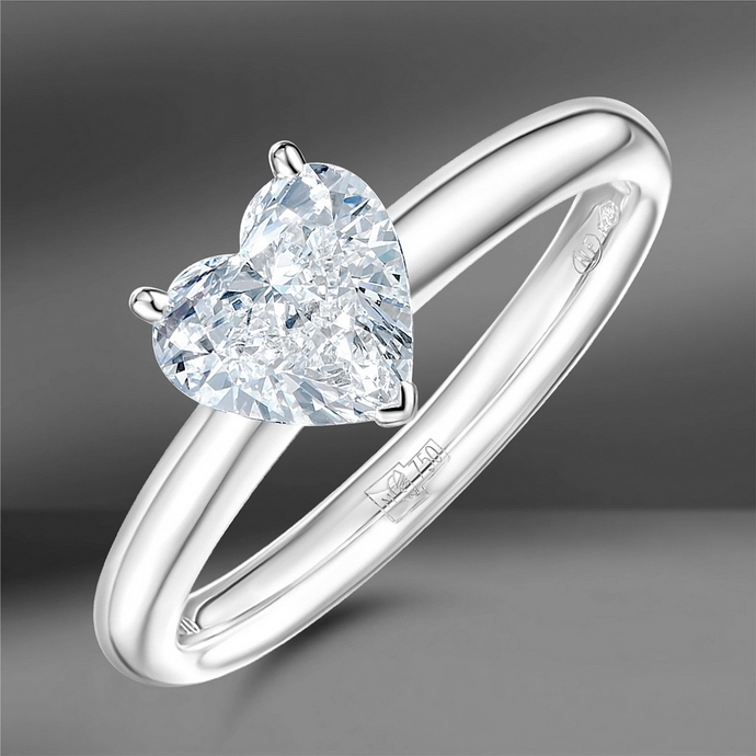 Золотое кольцо Mercury Classic с бриллиантом огранки «сердце» 1.01 Ct и золотое кольцо Emporium Gold с центральным бриллиантом огранки «сердце» 2.60 Ct