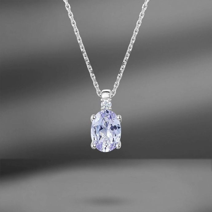 Золотое колье с танзанитом огранки «овал» и бриллиантом огранки «круг»