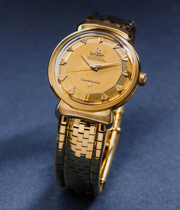 Реклама Omega Constellation Grand Luxe 1950-х годов и часы Constellation Grand Luxe ref. 14355 1954 года