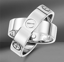 продажа Золотое кольцо Cartier Double Love в салоне «Emporium Gold»